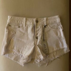 Just USA white denim shorts. Run true to size.